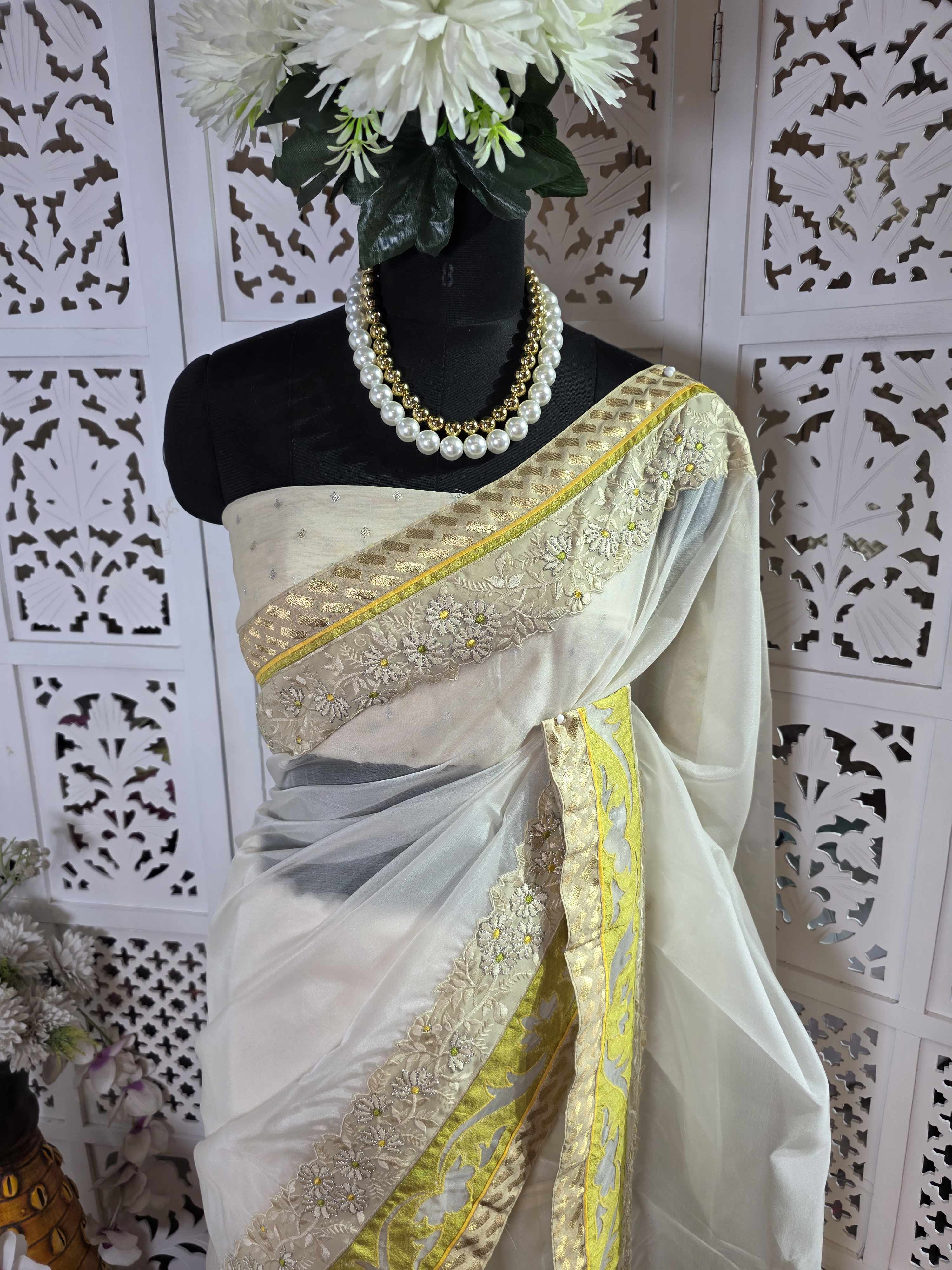 Organza saree with resham embroidry and banarasi patch border