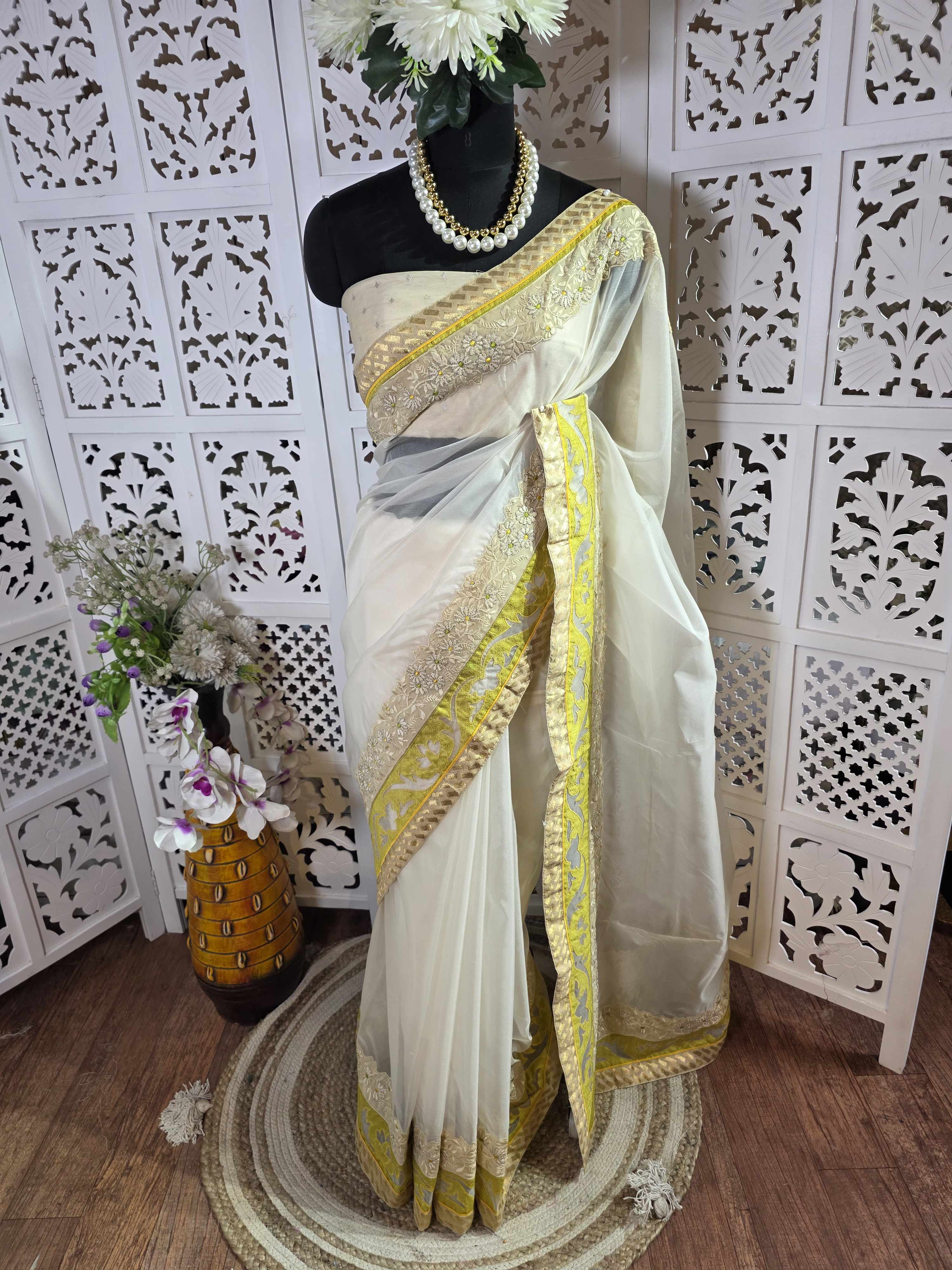 Organza saree with resham embroidry and banarasi patch border
