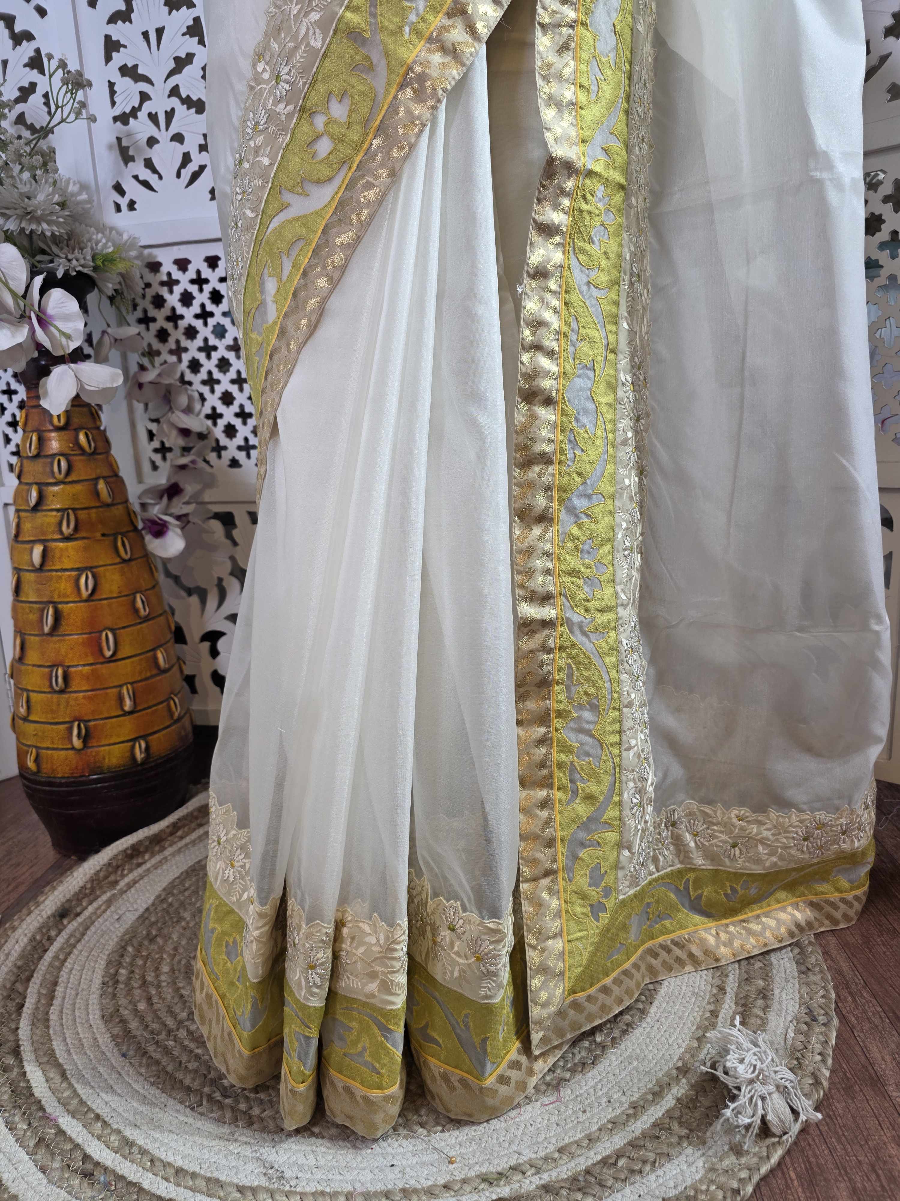 Organza saree with resham embroidry and banarasi patch border