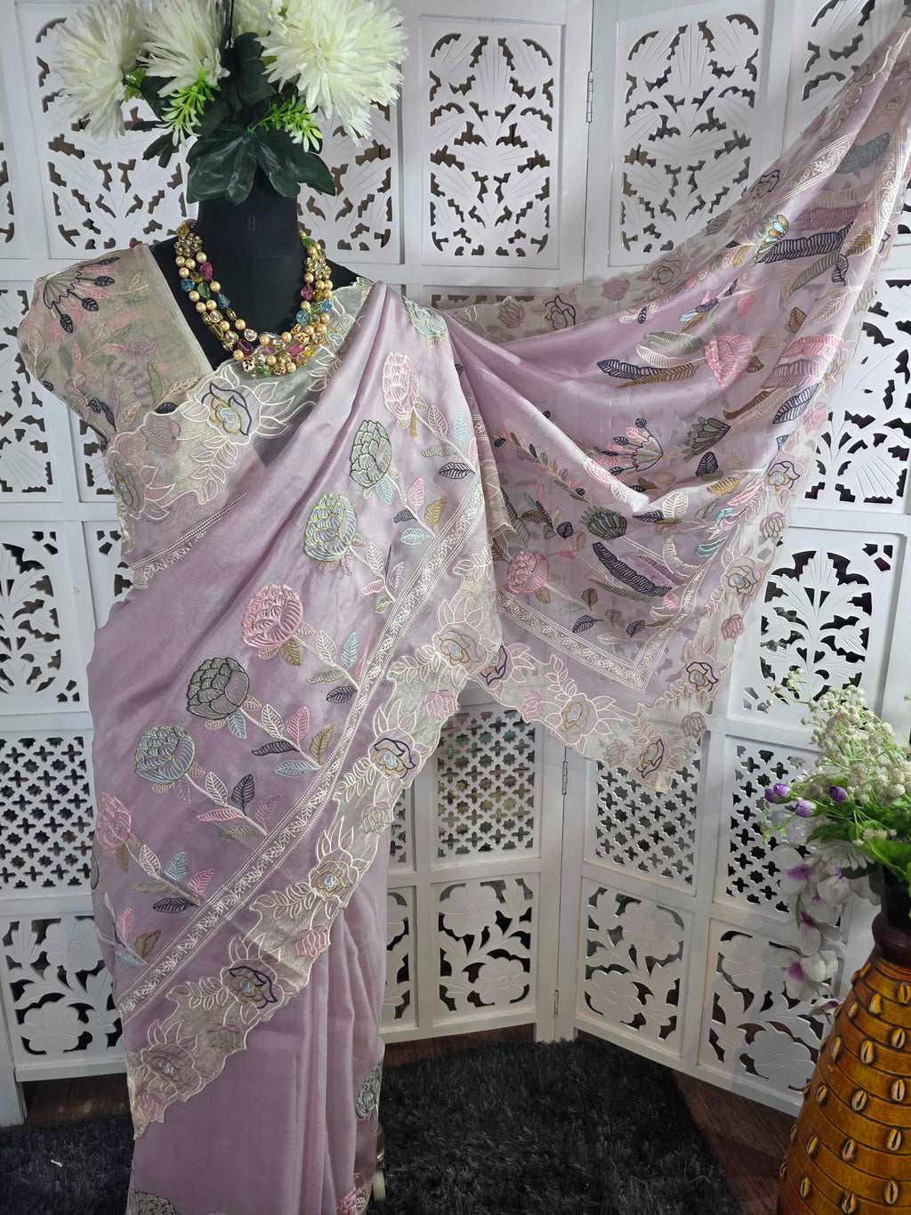 pure kora organza silk saree with beautiful multi resham thread work intricate imbroidery it has beautiful tissue applique and cutwork detailing along with this fully embroidered jaal work blouse