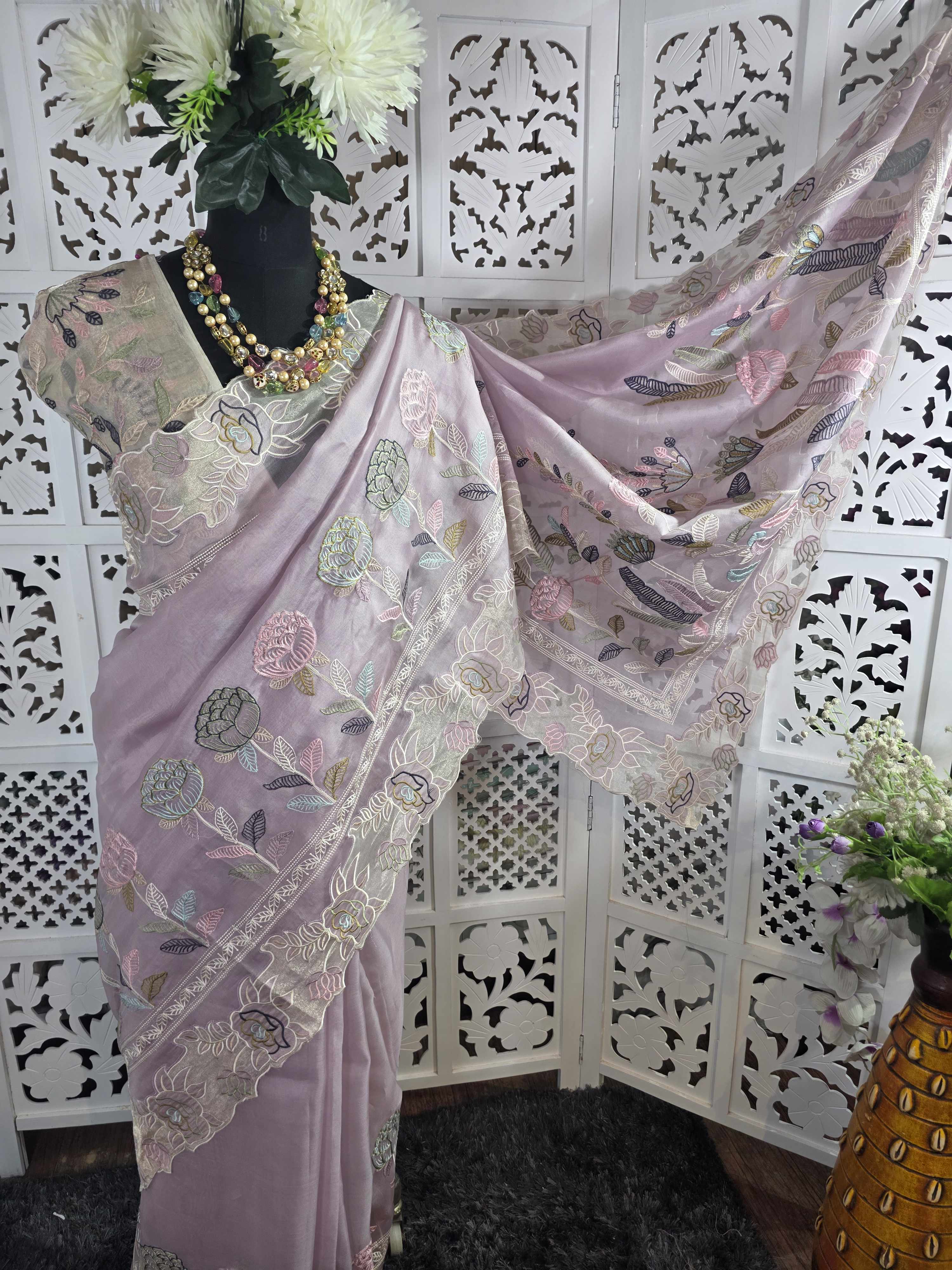 pure kora organza silk saree with beautiful multi resham thread work intricate imbroidery it has beautiful tissue applique and cutwork detailing along with this fully embroidered jaal work blouse