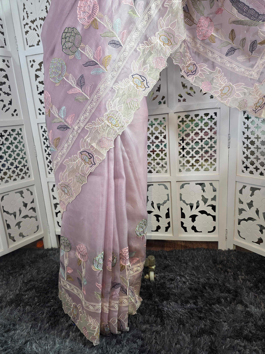 pure kora organza silk saree with beautiful multi resham thread work intricate imbroidery it has beautiful tissue applique and cutwork detailing along with this fully embroidered jaal work blouse