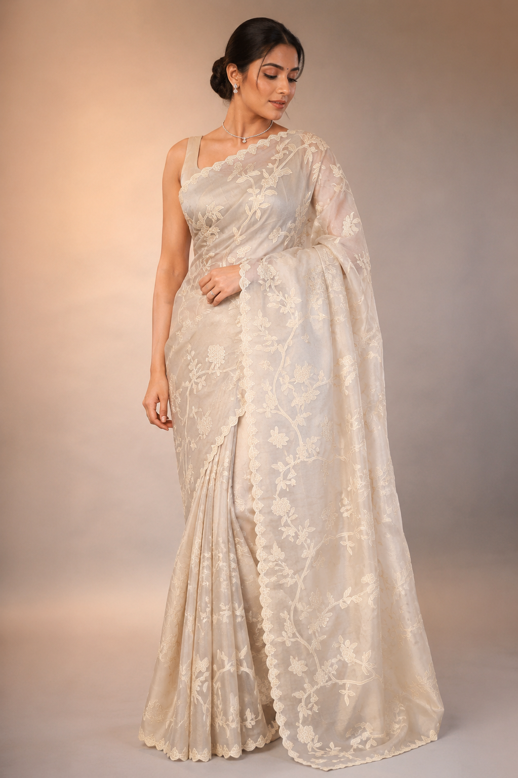 organza saree featuring intricate chanderi appliqué work