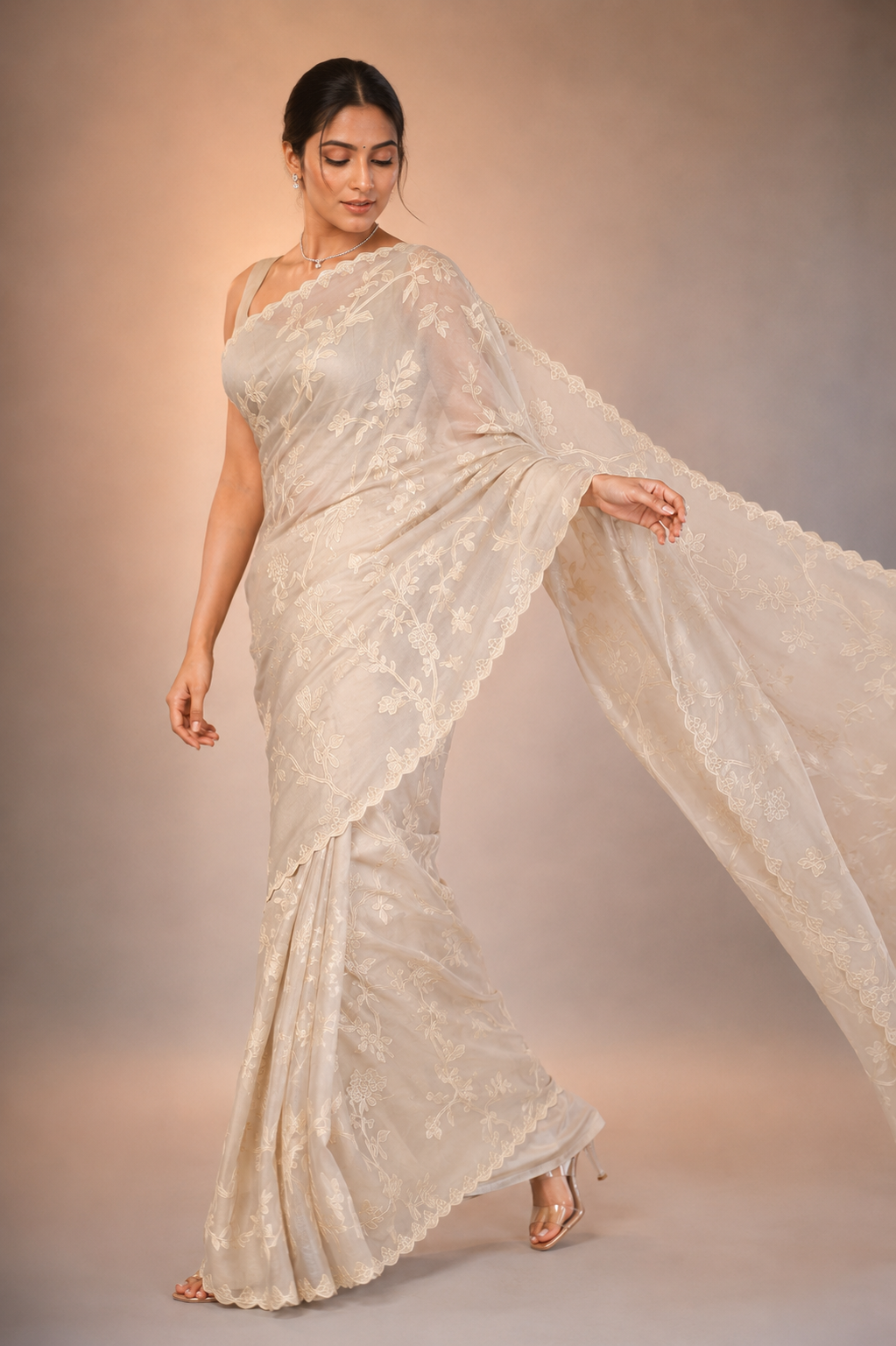 organza saree featuring intricate chanderi appliqué work
