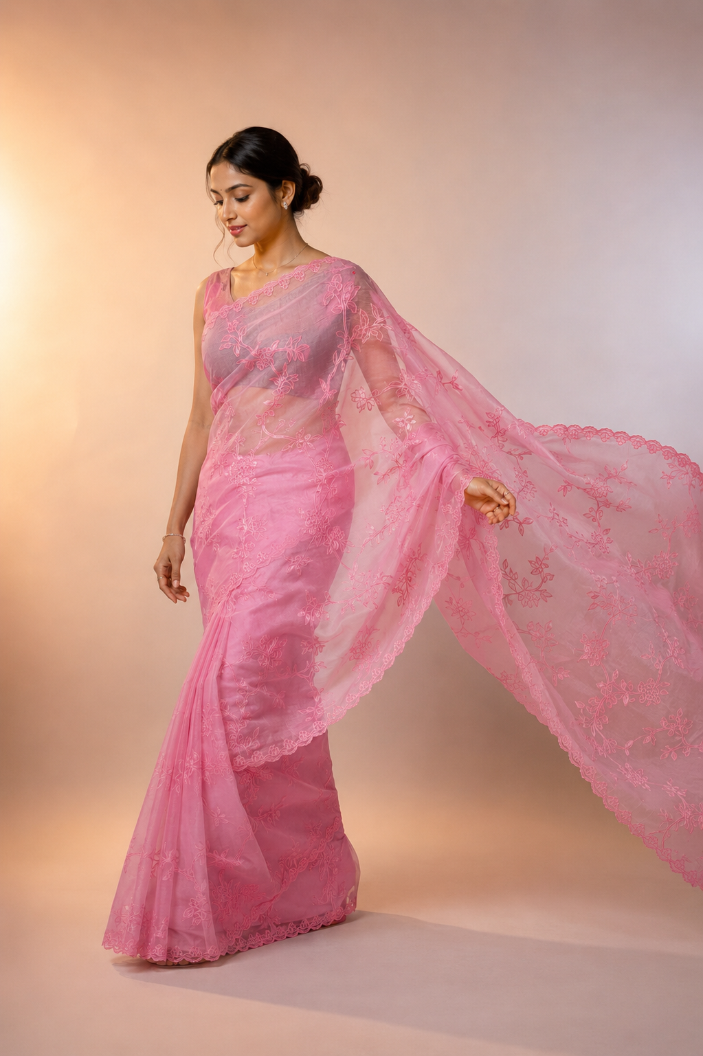 Organza saree featuring exquisite pure dopyan appliqué embroidery work.