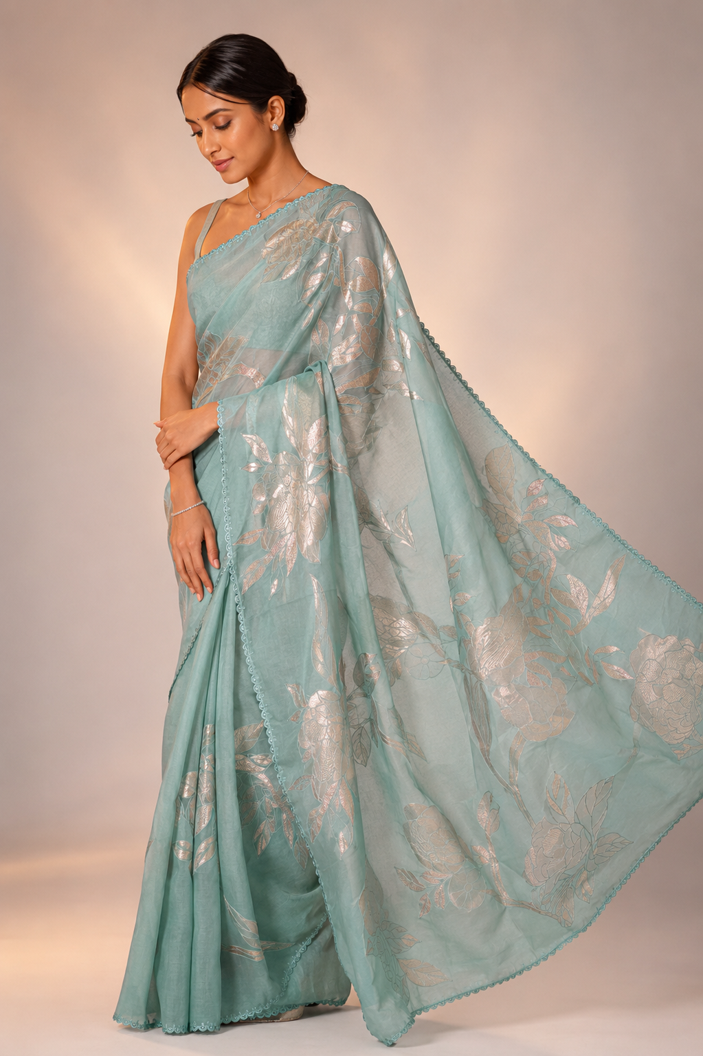 Organza saree crafted with delicate tissue and lustrous zari work
