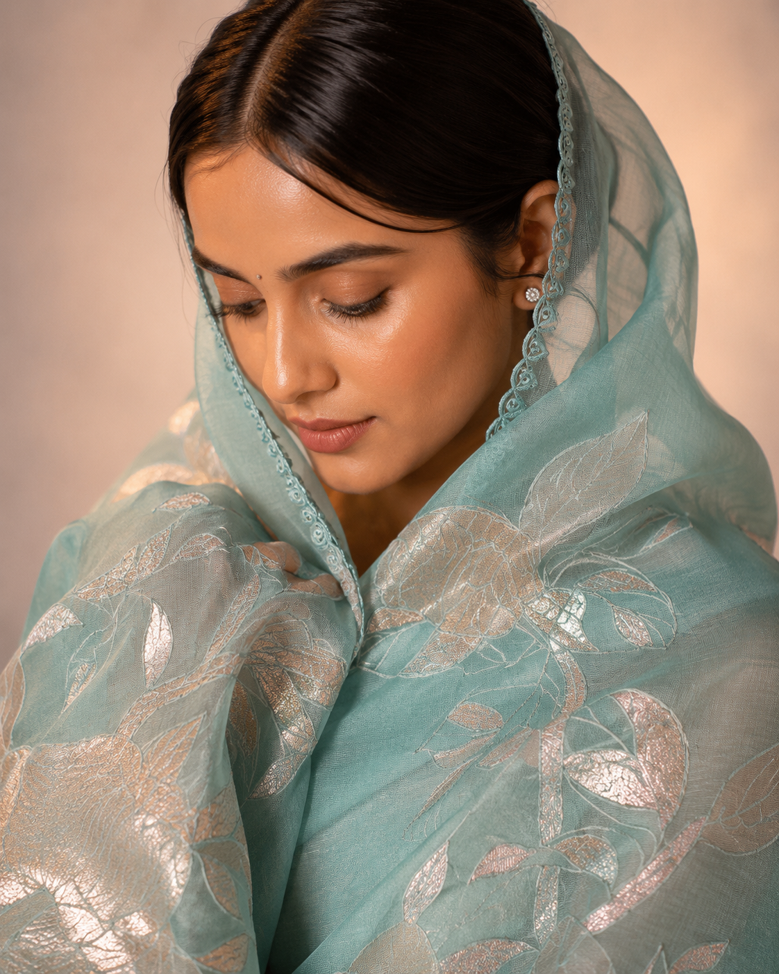 Organza saree crafted with delicate tissue and lustrous zari work